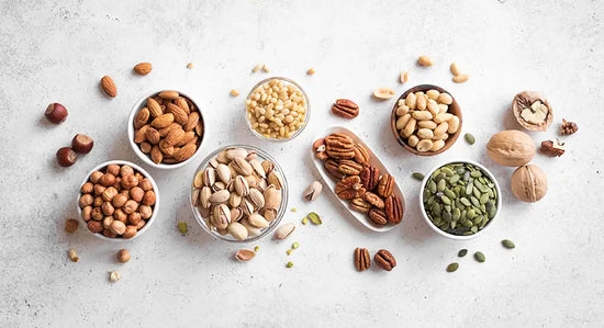 nuts and seeds in ramekins on a counter for liver health