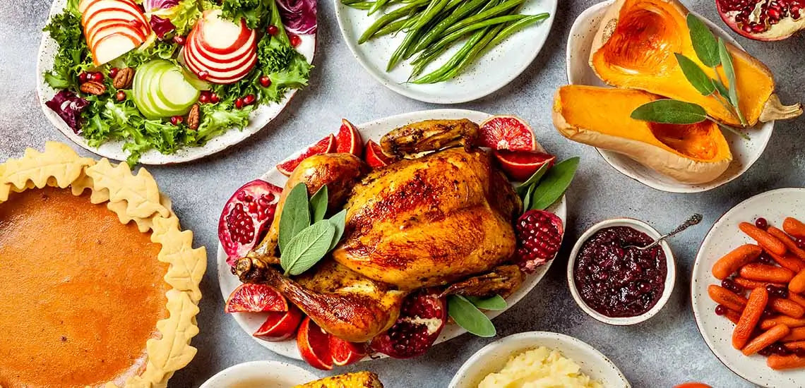 overhead photo of a healthy thanksgiving table